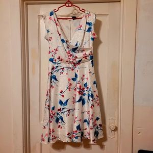 Sleeveless white dress with pink and blue florals